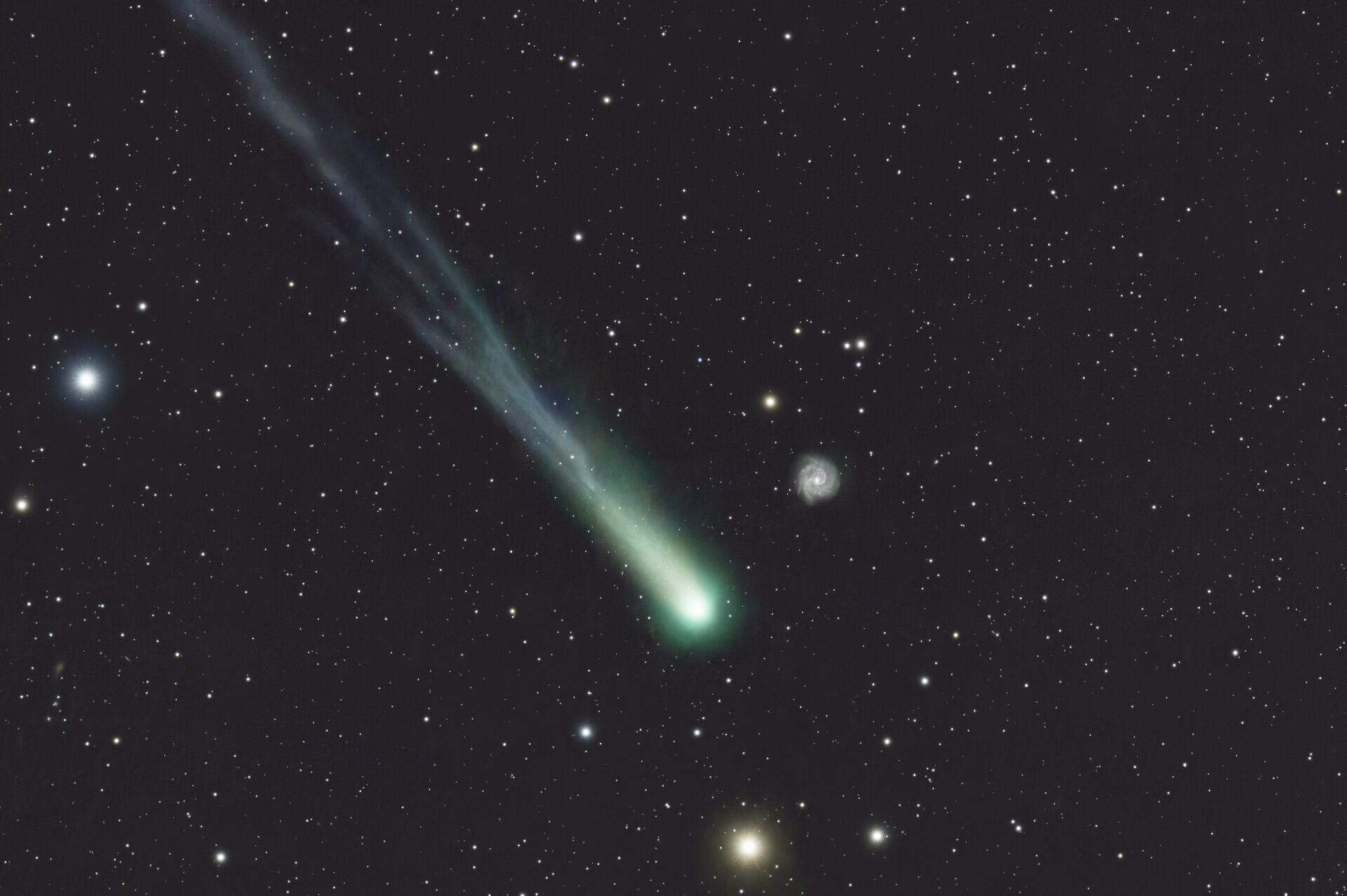 Comet Lemmon meets NGC 3184