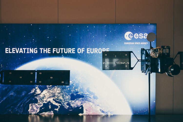 Satellite models at the ESA booth during the European Space Conference